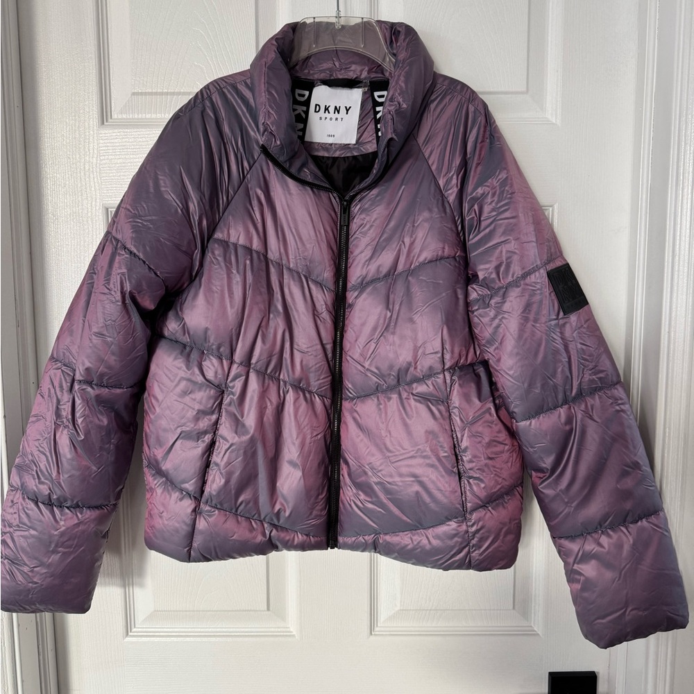 Like new DKNY women’s purple puffer jacket size Small.